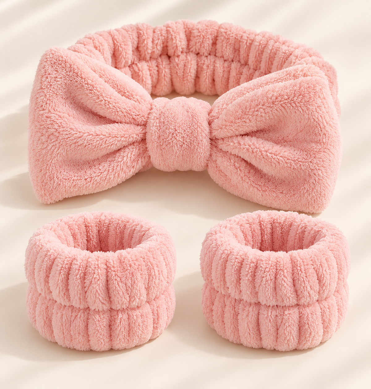 Full blush plush face-washing headband and both matching wristbands, fully visible